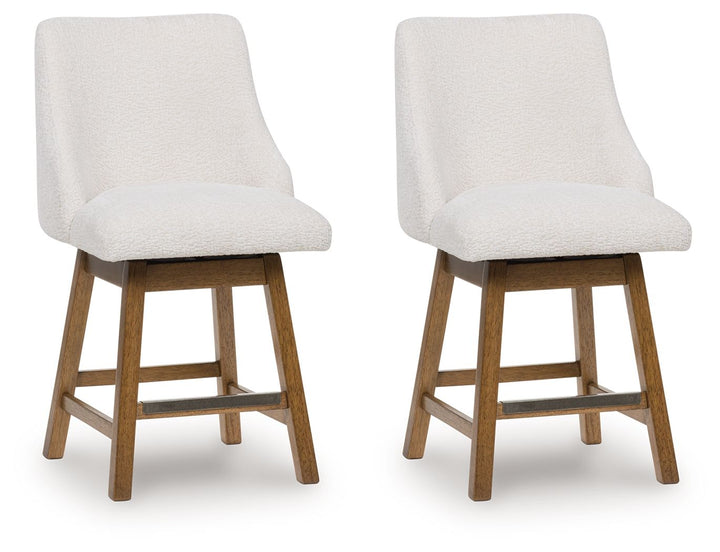 Cabalynn - Oatmeal / Light Brown - Upholstered Swivel Barstool (Set of 2)